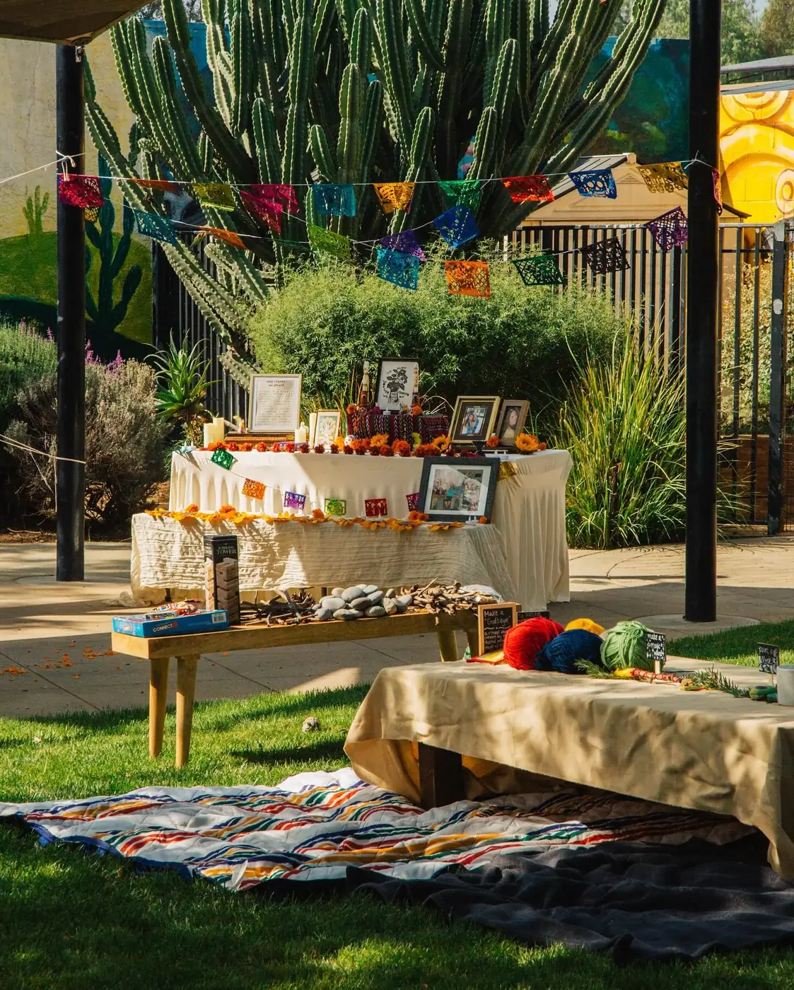 A local vendor table arranged beneath trees